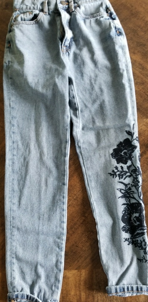 Faded floral, denim jeans